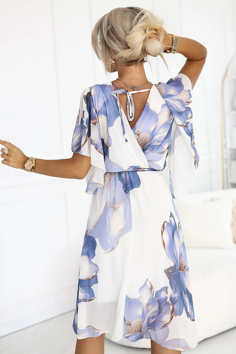 Robe fleurie fluide manches papillon - Image 3